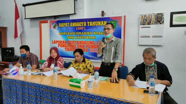 RAPAT ANGGOTA TAHUNAN RAT KOPERASI  DHARMA NIAGA SMK YAPIS BIAK 